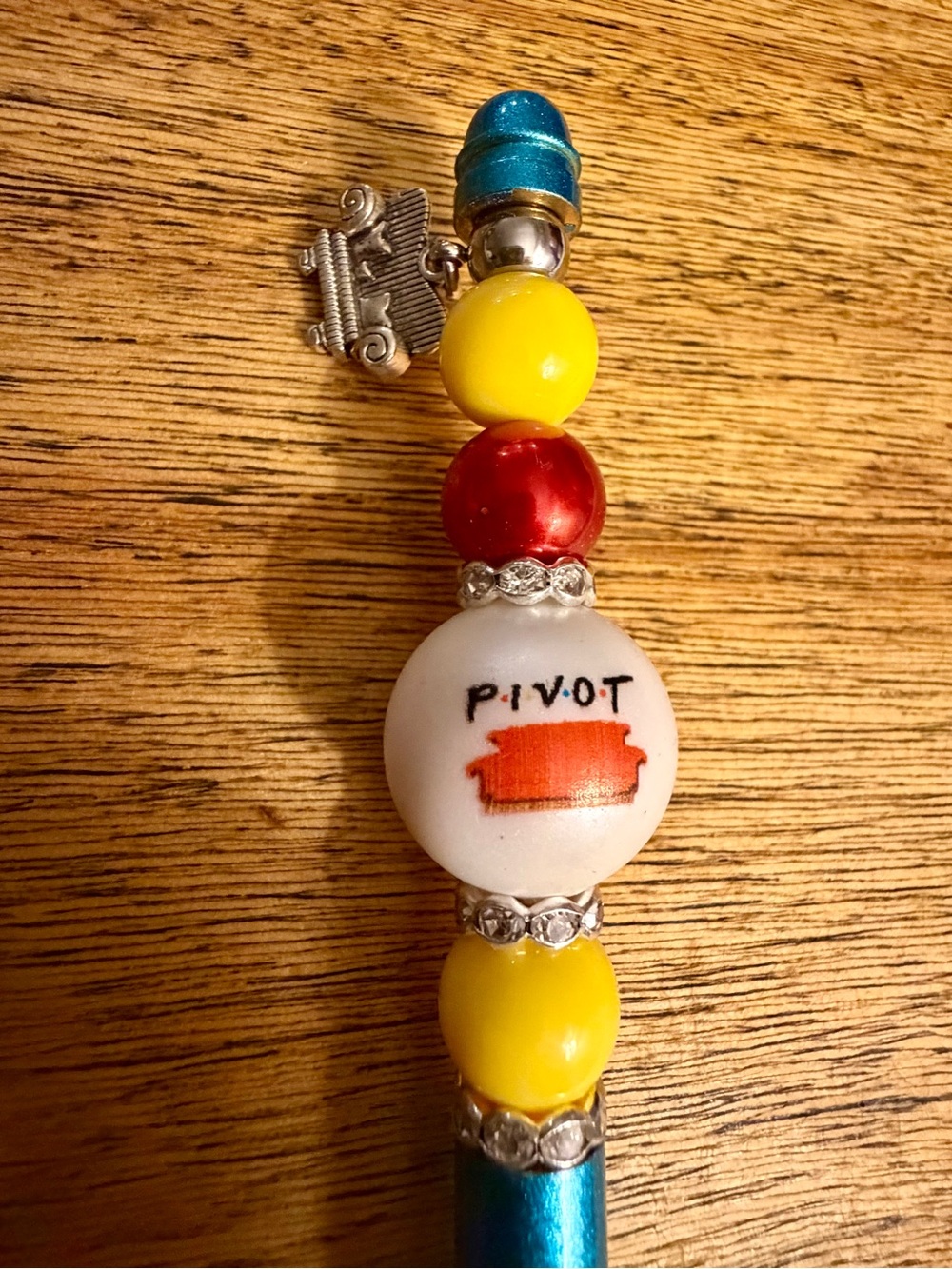 Pivot Bead Pen in Bright Yellow, Red & Teal Accents with Couch charm